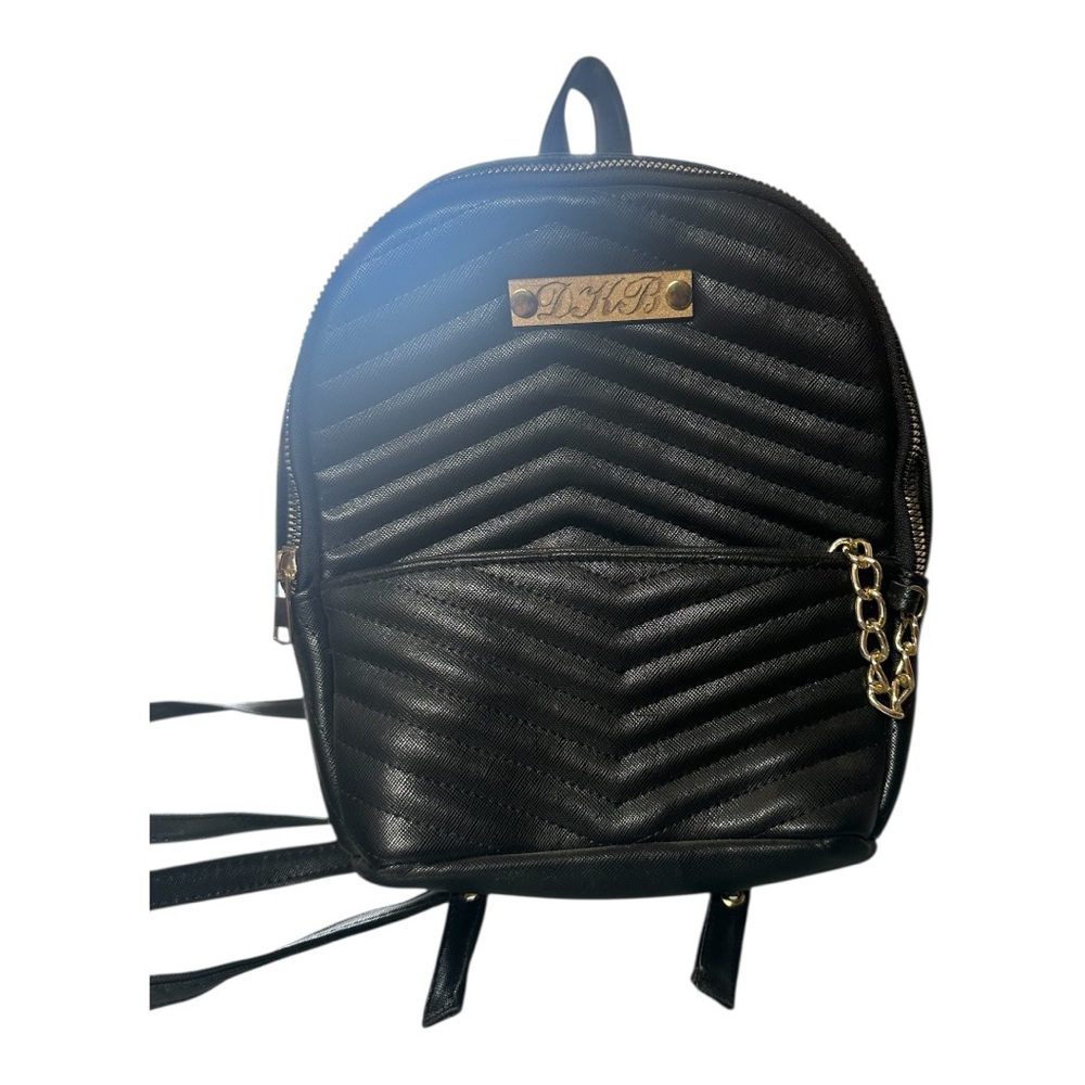 Elegant Black and Gold Quilted Backpack